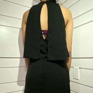 A short loose classy black dress